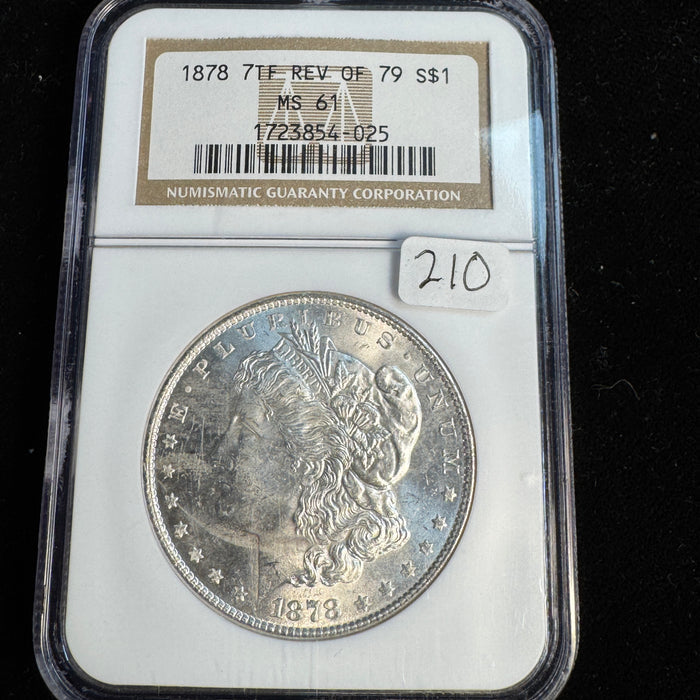 1878 7-TF Rev of ‘79 Morgan Silver Dollar, NGC MS-61