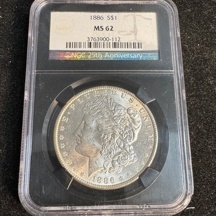 1886 Morgan Silver Dollar, NGC 25th Anniversary MS-62
