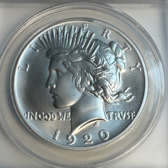 “1920” Daniel Carr Broken Sword Peace Dollar O/S on US Peace Dollar (1922-35) Host, ANACS MS-70
