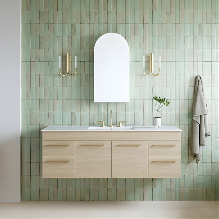 Timberline Indiana wall hung canity and Timberline church arch shaving cabinet with mirror in a beautiful aqua blue handmade tiled bathroom and Phoenix plus lever gold tapware and telbix joshua wall lights in gold.