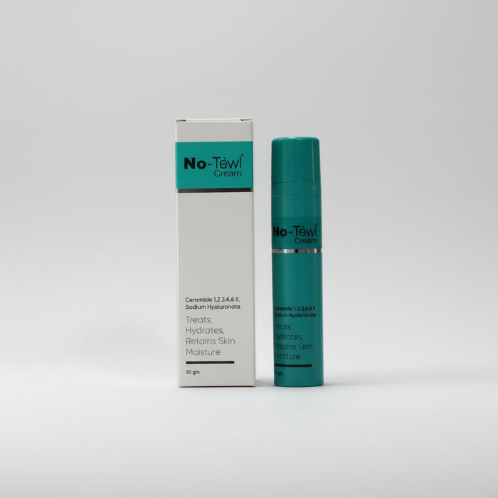 No Tewl Cream packaging, featuring a cylindrical container with a green cap and a matching box with product information.