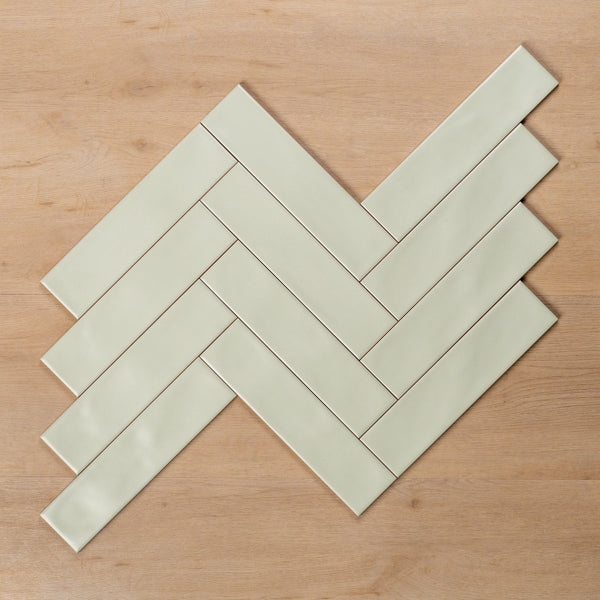 Whitehaven Green Wavy Satin Ceramic Subway Tile 68x280mm Herringbone Pattern - The Blue Space